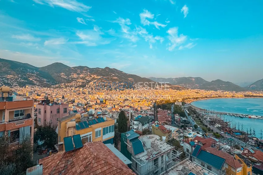 Purchase  3+1 apartment for a residence permit in Alanya, Kale district - furnished and with panoramic views of the sea and port  45 