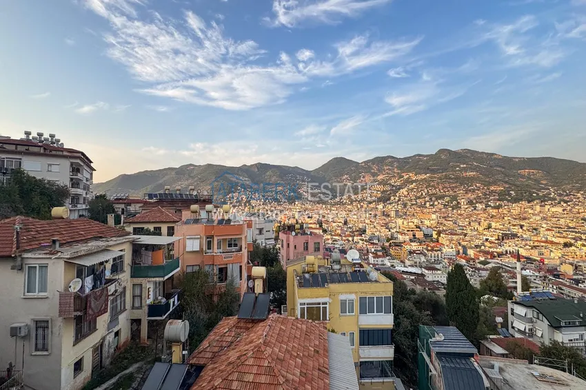 Purchase  3+1 apartment for a residence permit in Alanya, Kale district - furnished and with panoramic views of the sea and port  50 