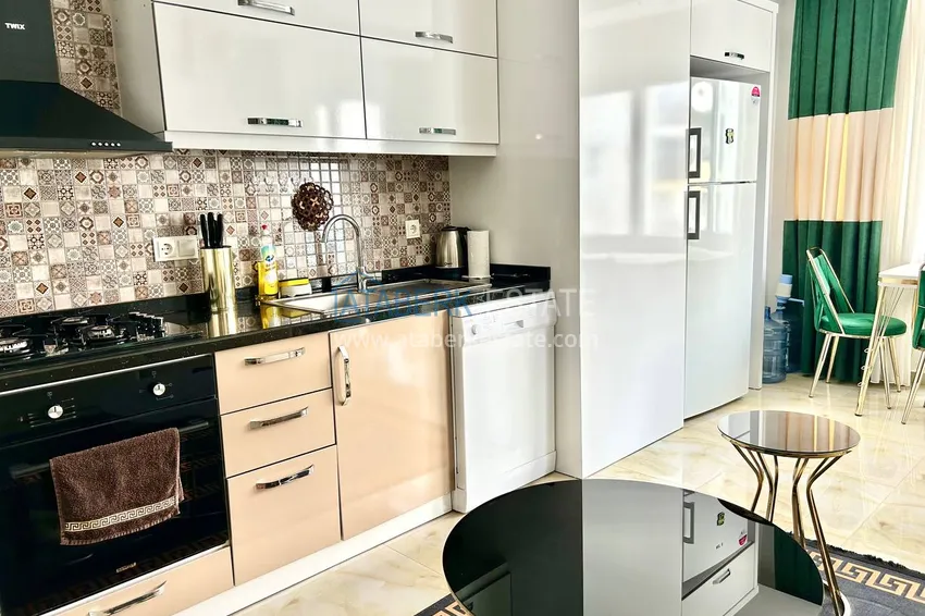 Purchase 2+1 apartment in Mahmutlar furnished near the sea - Barbarossa Street 4