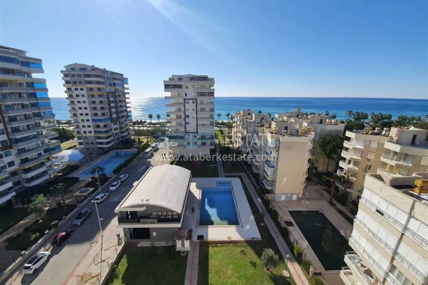 Apartment 2+1 on the beachfront in the center of Mahmutlar, Alanya — real estate for citizenship 1 