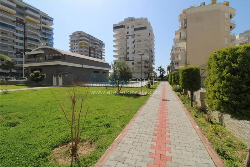 Apartment 2+1 on the beachfront in the center of Mahmutlar, Alanya — real estate for citizenship 5 