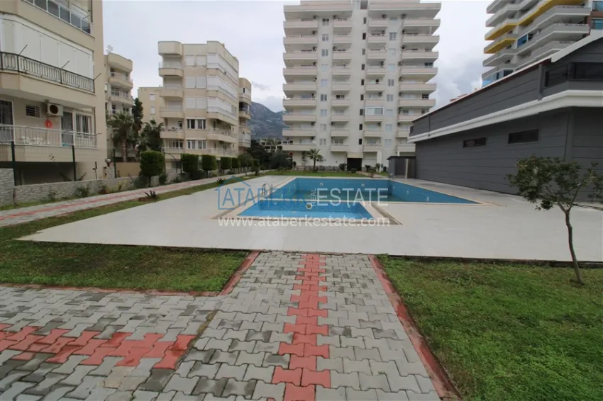 Apartment 2+1 on the beachfront in the center of Mahmutlar, Alanya — real estate for citizenship 6 
