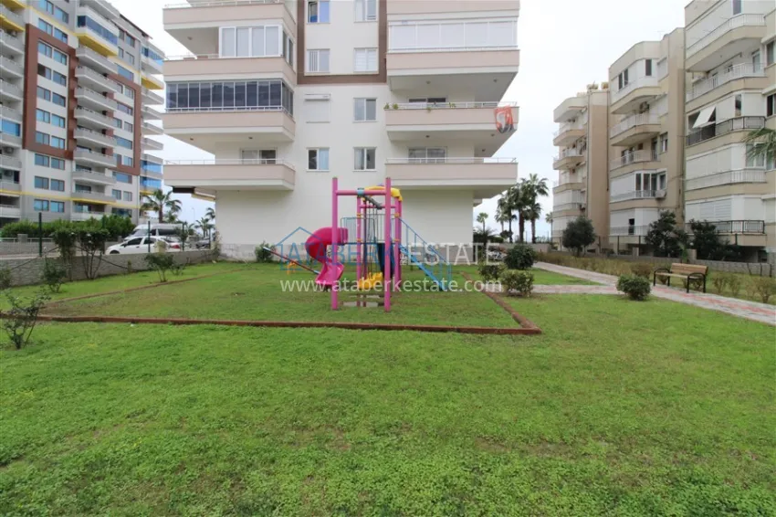 Apartment 2+1 on the beachfront in the center of Mahmutlar, Alanya — real estate for citizenship 7 