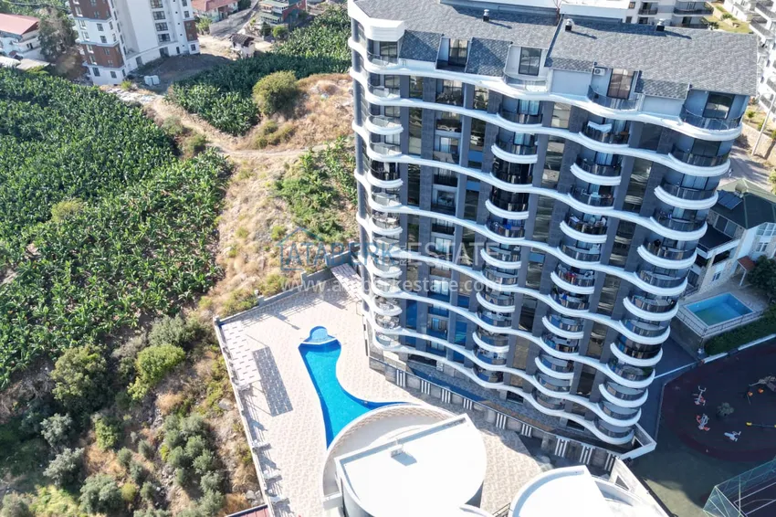 2+1 apartment with furniture and sea and mountain views in a luxury complex — Alanya, Mahmutlar district 6 