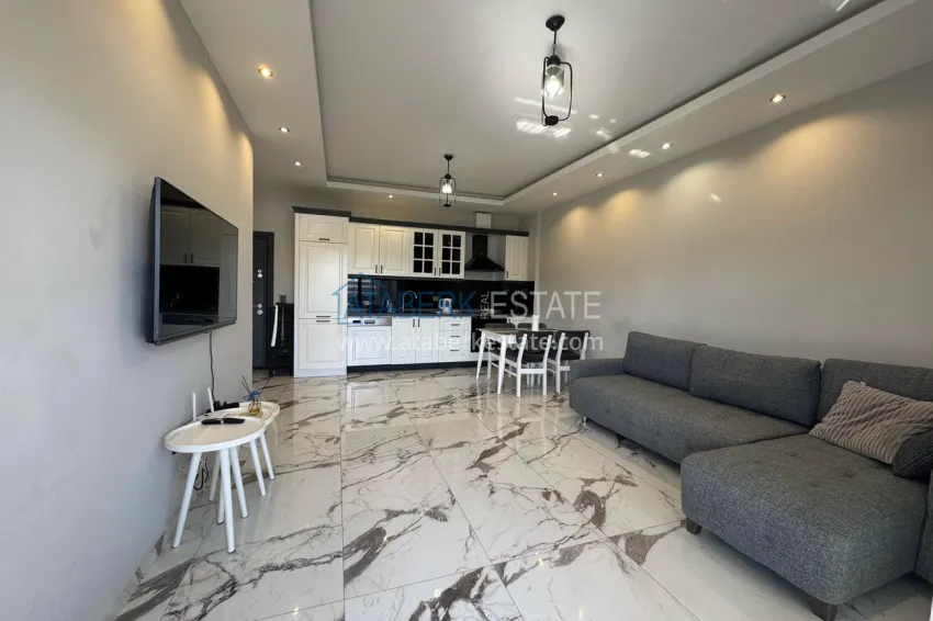 Purchase 1+1 furnished apartment in Alanya, Kestel - 150 m to the sea, glazed balcony 6 