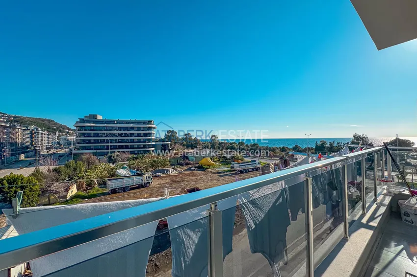 Purchase Linear 3+1 apartment in Kargicak on the first line — with a separate kitchen and sea view 12