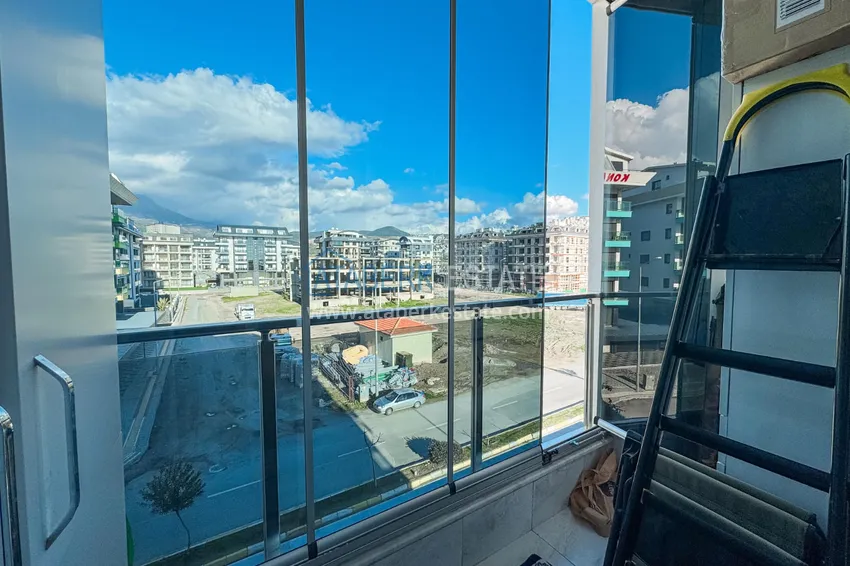 Purchase Linear 3+1 apartment in Kargicak on the first line — with a separate kitchen and sea view 14