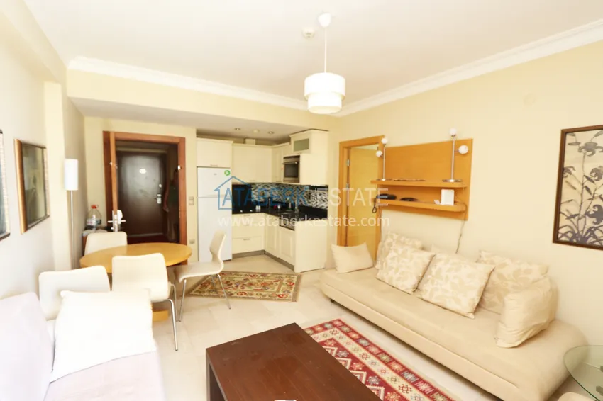 Purchase  1+1 apartment in the famous resort-style - fully furnished in Mahmutlar 1 