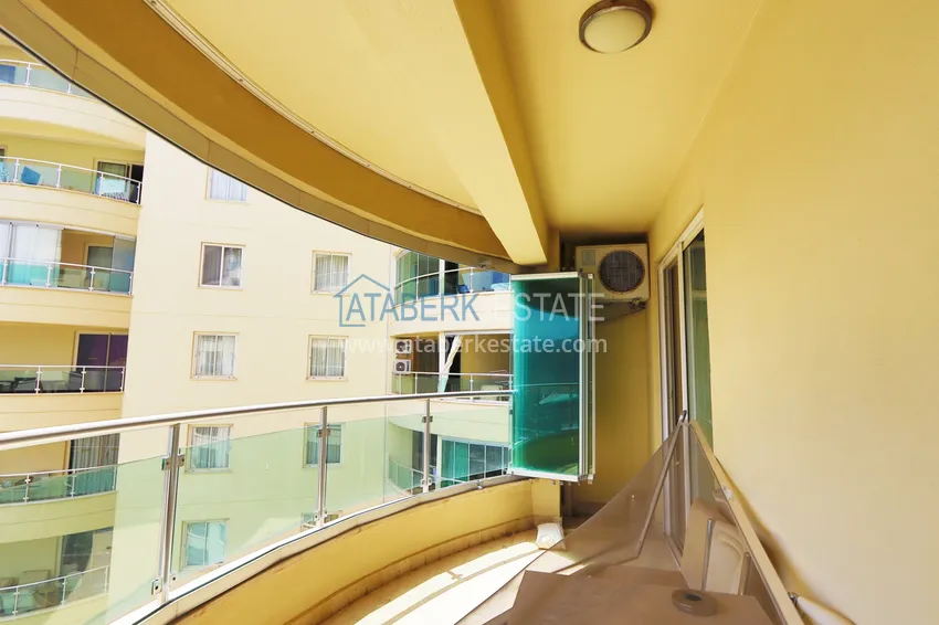 Purchase  1+1 apartment in the famous resort-style - fully furnished in Mahmutlar 14 