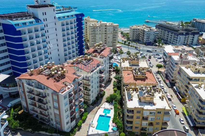 2+1 apartment in Tosmur with a separate kitchen 200 m from the sea — property for a residence permit in Alanya 1 