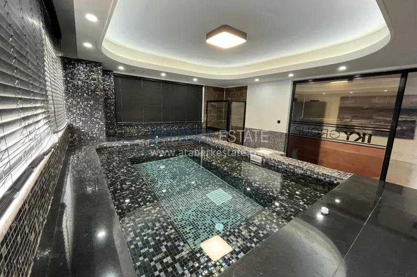 1+1 apartment in Alanya, Oba district with furniture and mountain views — installments up to 6 months 12