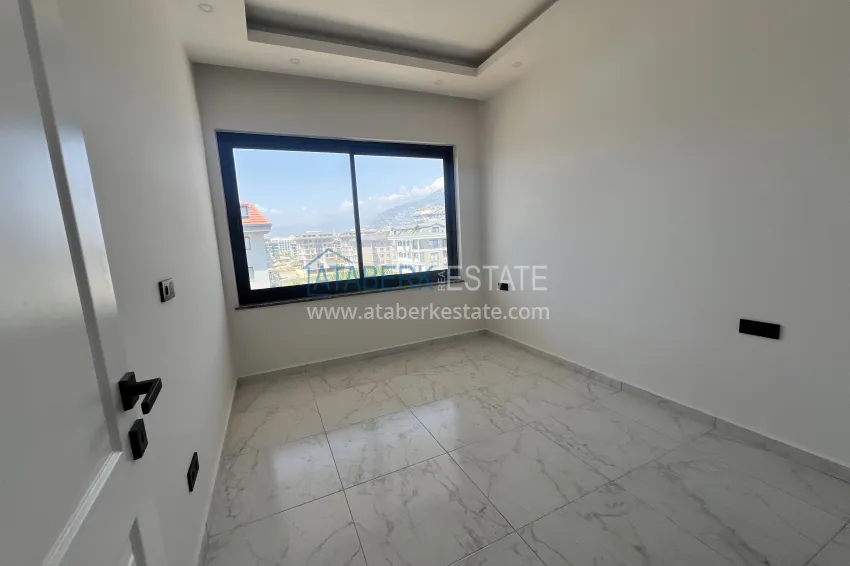 Purchase 2+1 duplex in Kargicak, 250 meters from the beach - duplex penthouse with sea view 11 