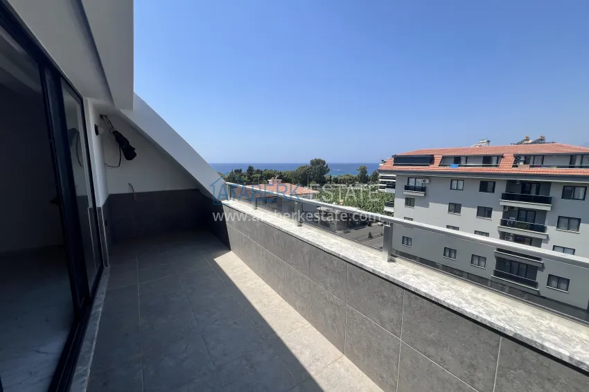 Purchase 2+1 duplex in Kargicak, 250 meters from the beach - duplex penthouse with sea view 16 
