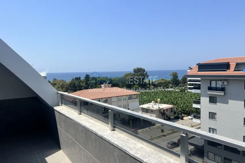 Purchase 2+1 duplex in Kargicak, 250 meters from the beach - duplex penthouse with sea view 17 