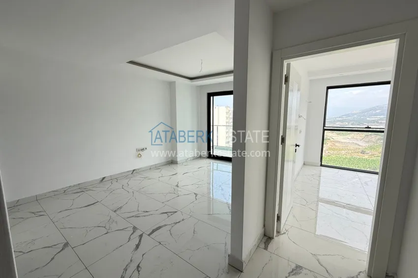 Purchase Good price! Apartment 1+1 in Mahmutlar — property under a residence permit with mountain views 2