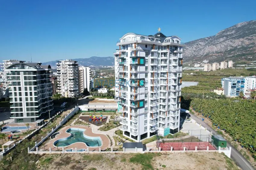 Good price! Apartment 1+1 in Mahmutlar — property under a residence permit with mountain views 3