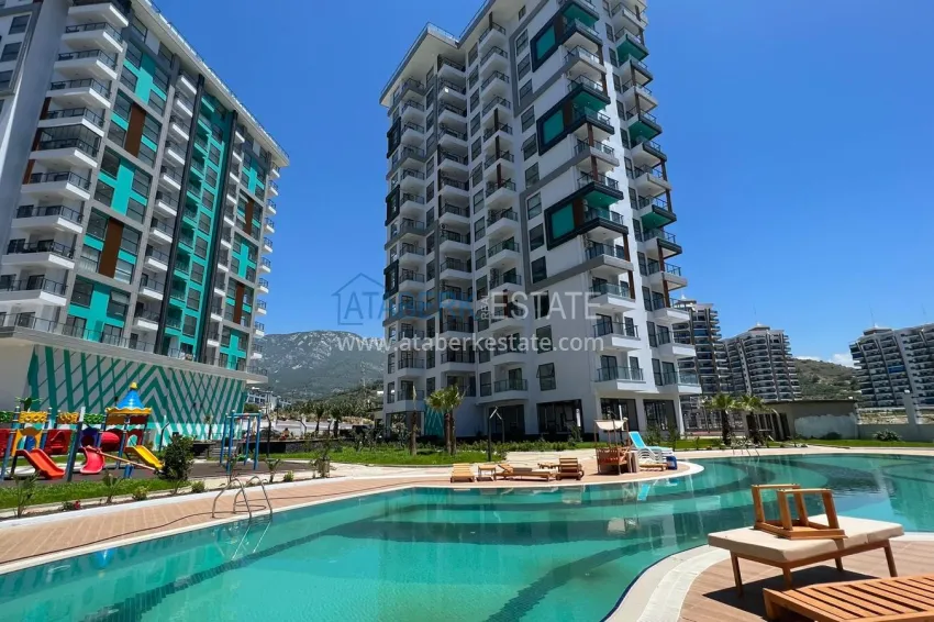 Good price! Apartment 1+1 in Mahmutlar — property under a residence permit with mountain views 7