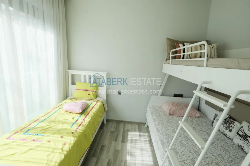 Purchase Garden duplex 3+1 in Kargicak with furniture - property under citizenship 14 