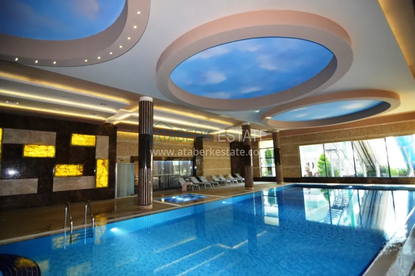 Garden duplex 3+1 in Kargicak with furniture - property under citizenship 15 