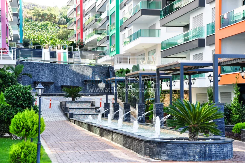 Garden duplex 3+1 in Kargicak with furniture - property under citizenship 8 