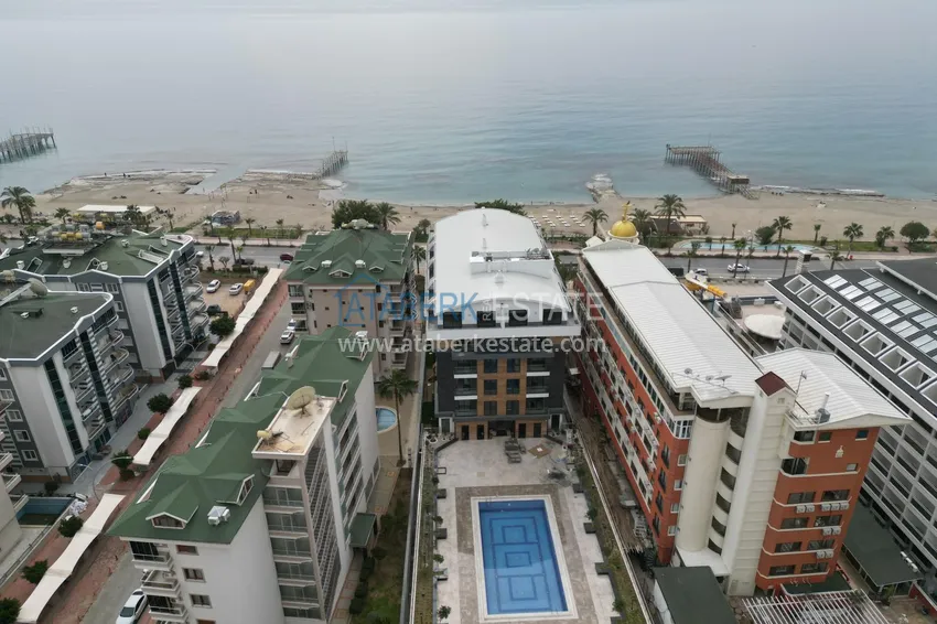 1+1 apartment with sea view in a complex on the beachfront in the Oba area 1 