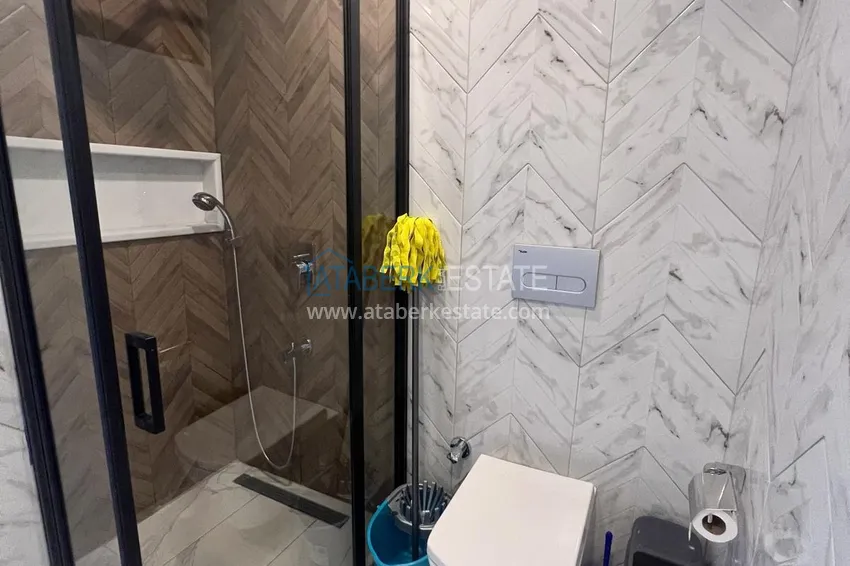 Purchase 1+1 furnished apartment in the center of Alanya - Hadjet district, near the sea 10