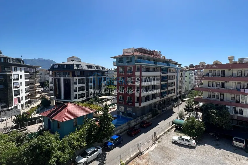 Purchase 1+1 furnished apartment in the center of Alanya - Hadjet district, near the sea 13