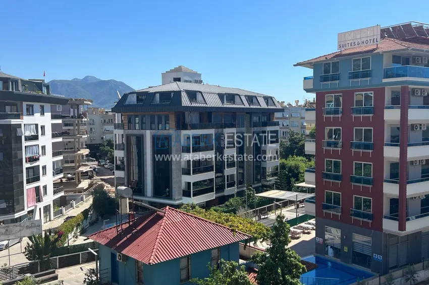 Purchase 1+1 furnished apartment in the center of Alanya - Hadjet district, near the sea 14