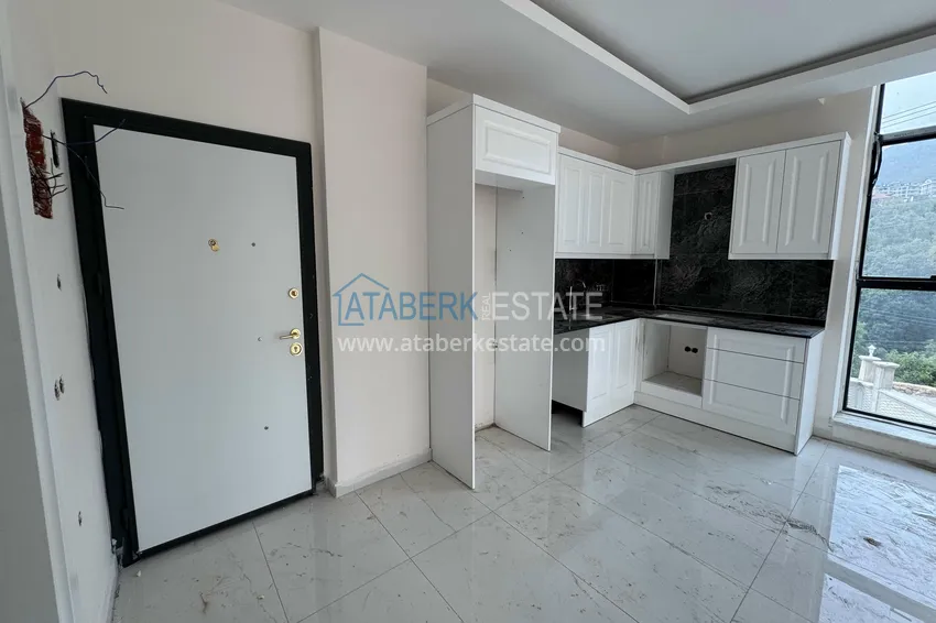 Purchase 1+1 apartment with mountain views in Alanya, Oba district 1 