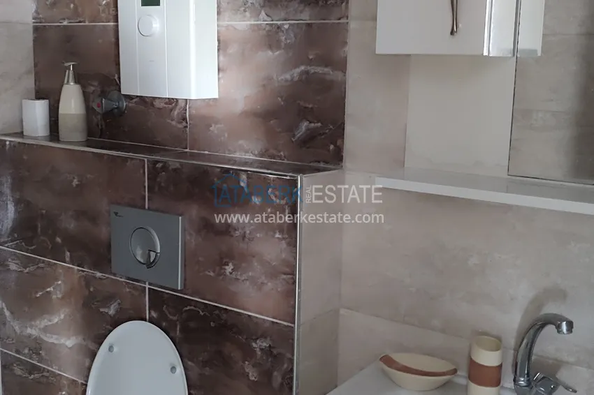 Purchase  Apartment 1+1 in Tosmur with furniture a step away from the sea — suitable for obtaining a residence permit 9 