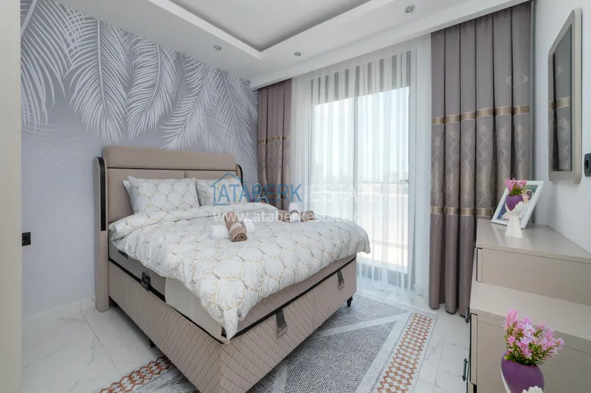 Purchase  2+1 duplex in Mahmutlar - furnished and with sea view  12 