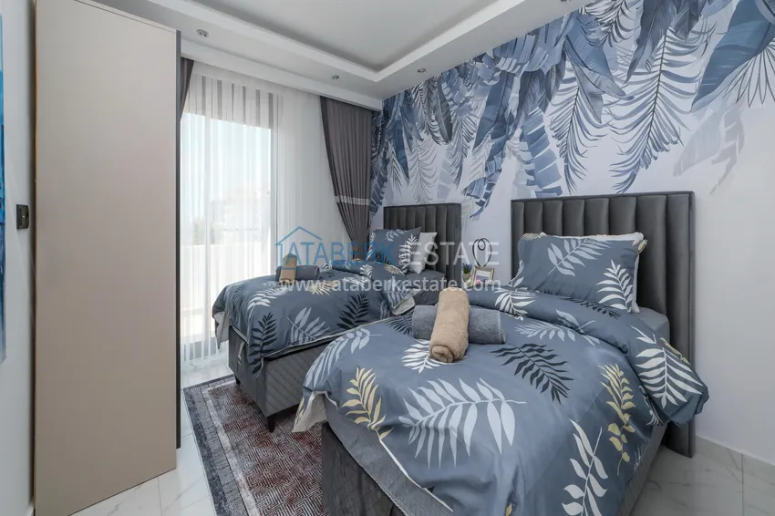 Purchase  2+1 duplex in Mahmutlar - furnished and with sea view  16 