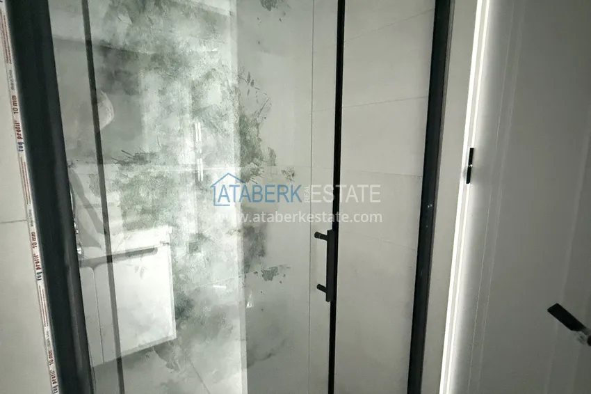 Purchase  1+1 apartment with mountain views in Mahmutlar - resort-format complex 13 