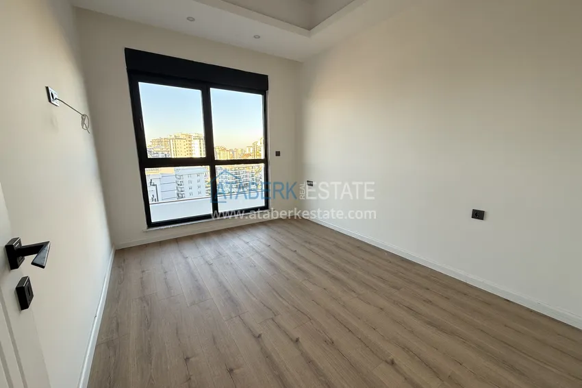 Purchase  1+1 apartment with mountain views in Mahmutlar - resort-format complex 9 