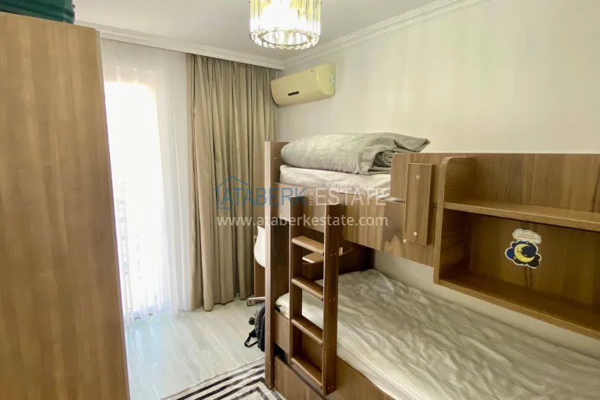 Purchase 2+1 apartment with sea view in the center of Mahmutlar — furniture, separate kitchen and glazed balcony 12 