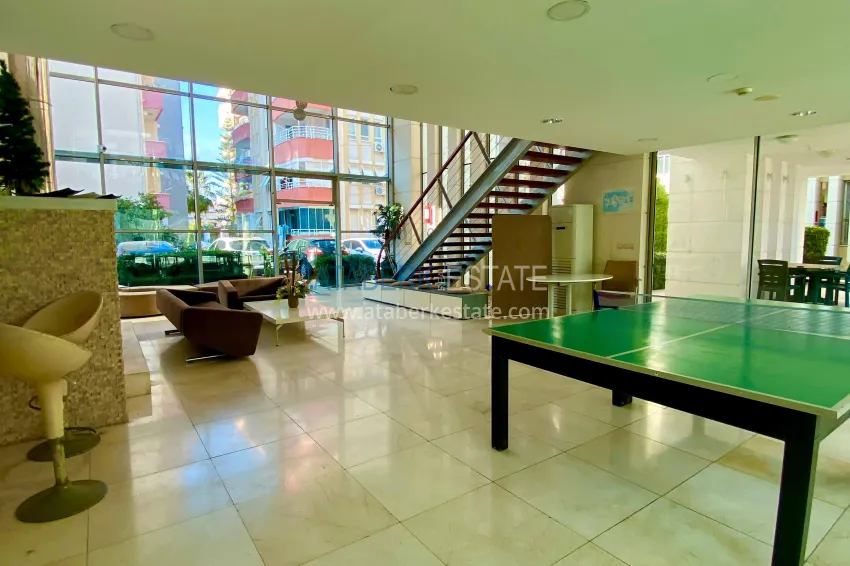 2+1 apartment with sea view in the center of Mahmutlar — furniture, separate kitchen and glazed balcony 13 