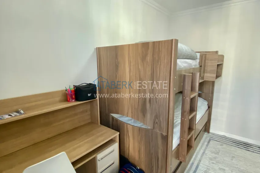 Purchase 2+1 apartment with sea view in the center of Mahmutlar — furniture, separate kitchen and glazed balcony 13 