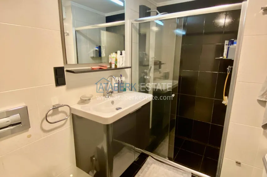 Purchase 2+1 apartment with sea view in the center of Mahmutlar — furniture, separate kitchen and glazed balcony 16 