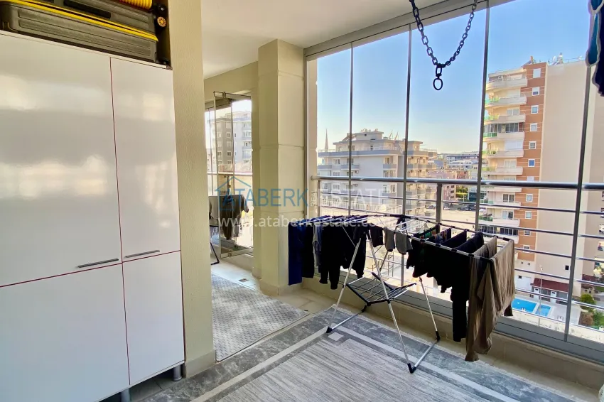 Purchase 2+1 apartment with sea view in the center of Mahmutlar — furniture, separate kitchen and glazed balcony 21 