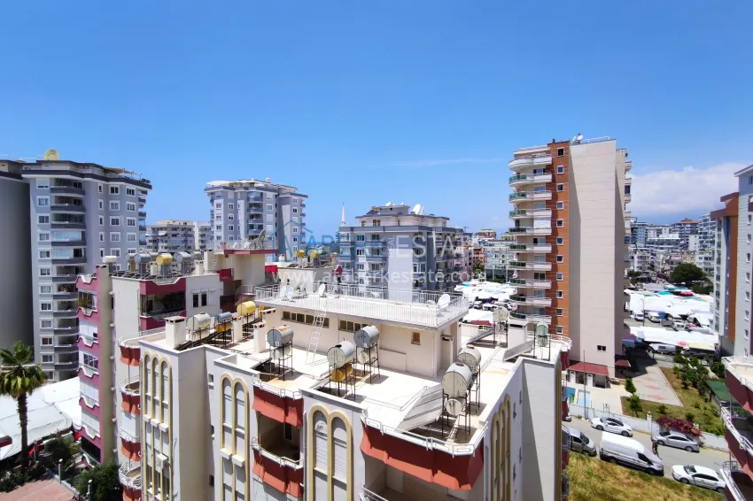Purchase 2+1 apartment with sea view in the center of Mahmutlar — furniture, separate kitchen and glazed balcony 22 