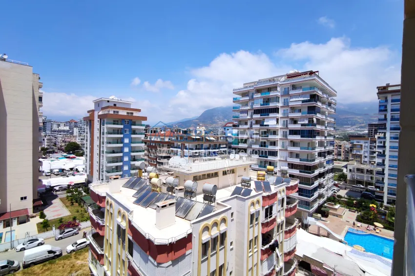 Purchase 2+1 apartment with sea view in the center of Mahmutlar — furniture, separate kitchen and glazed balcony 23 