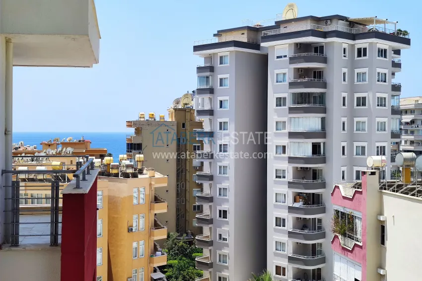 Purchase 2+1 apartment with sea view in the center of Mahmutlar — furniture, separate kitchen and glazed balcony 25 