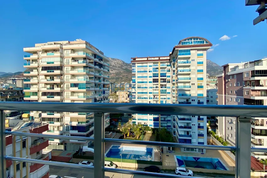 Purchase 2+1 apartment with sea view in the center of Mahmutlar — furniture, separate kitchen and glazed balcony 26 
