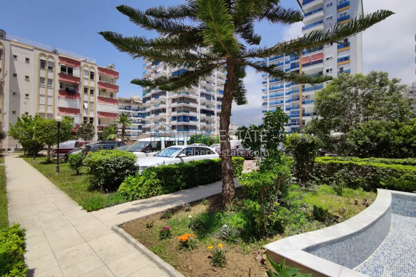 2+1 apartment with sea view in the center of Mahmutlar — furniture, separate kitchen and glazed balcony 6 