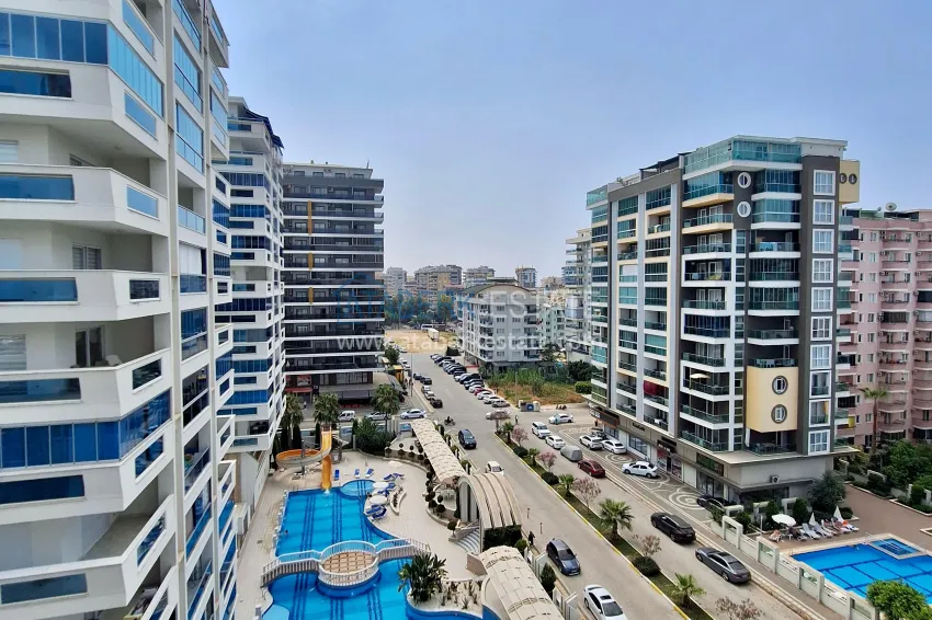 Purchase 2+1 apartment in Mahmutlar — with luxury furniture, glazed balconies and sea views 13 