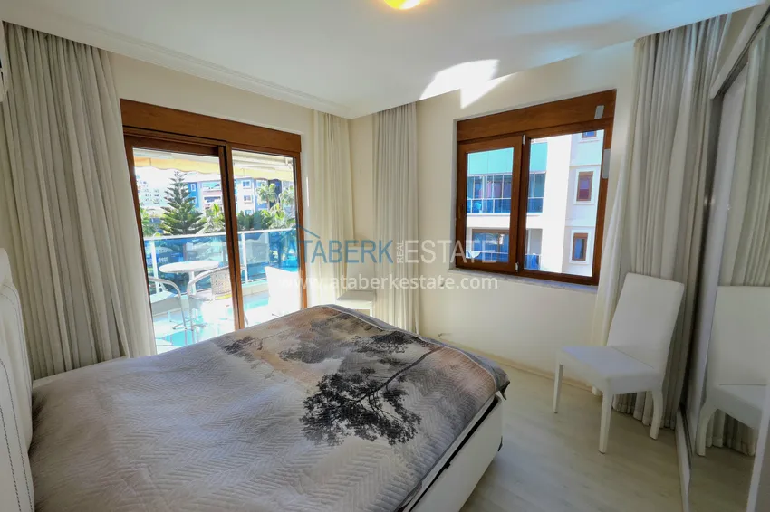 Purchase 3+1 single-level apartment with furniture in Oba, Alanya 11