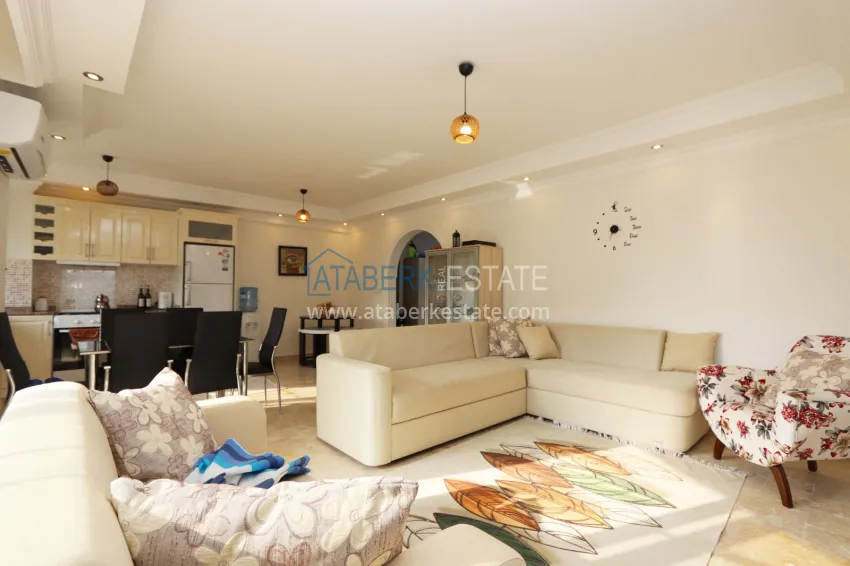 Purchase 2+1 apartment with furniture and access to the garden in the Avsallar area 13