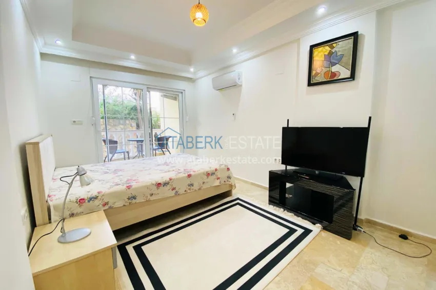 Purchase 2+1 apartment with furniture and access to the garden in the Avsallar area 16