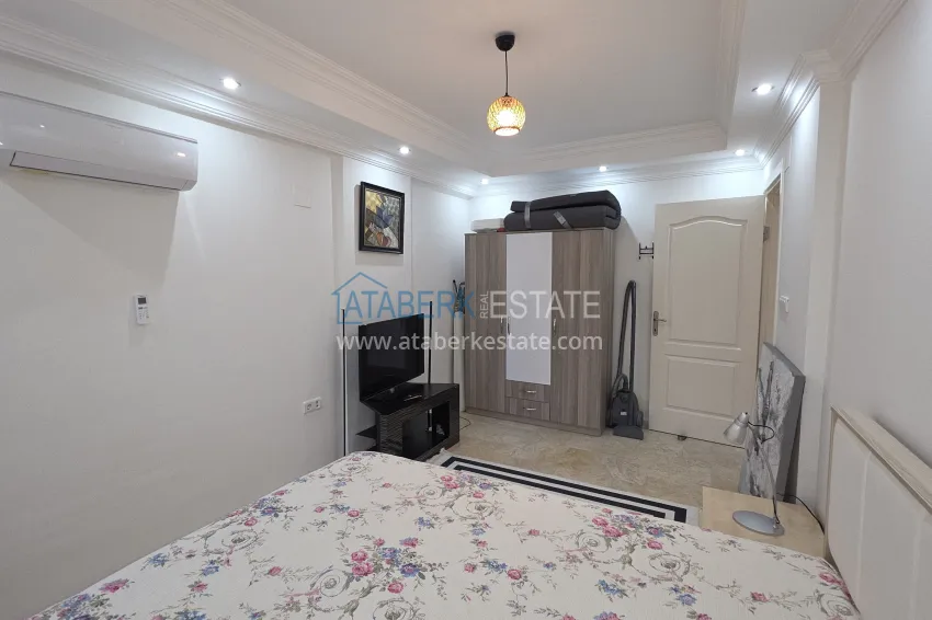 Purchase 2+1 apartment with furniture and access to the garden in the Avsallar area 18