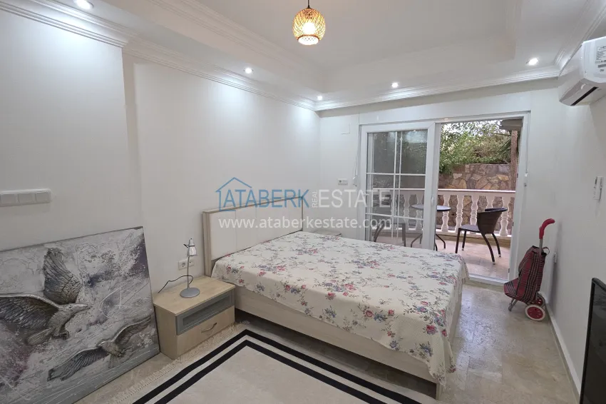 Purchase 2+1 apartment with furniture and access to the garden in the Avsallar area 19